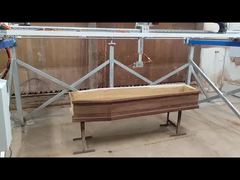 Sistema di Finitura per Prodotti Funebri in Legno